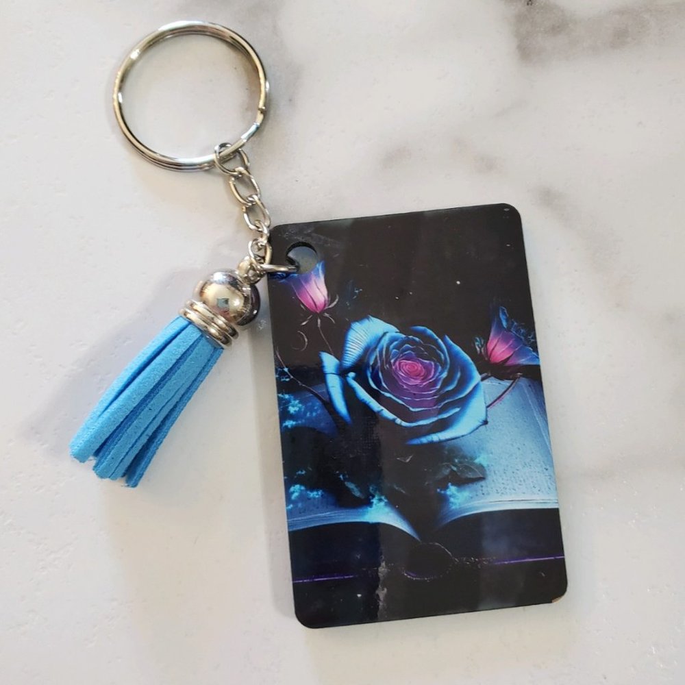 Blue Rose on Book Keychain